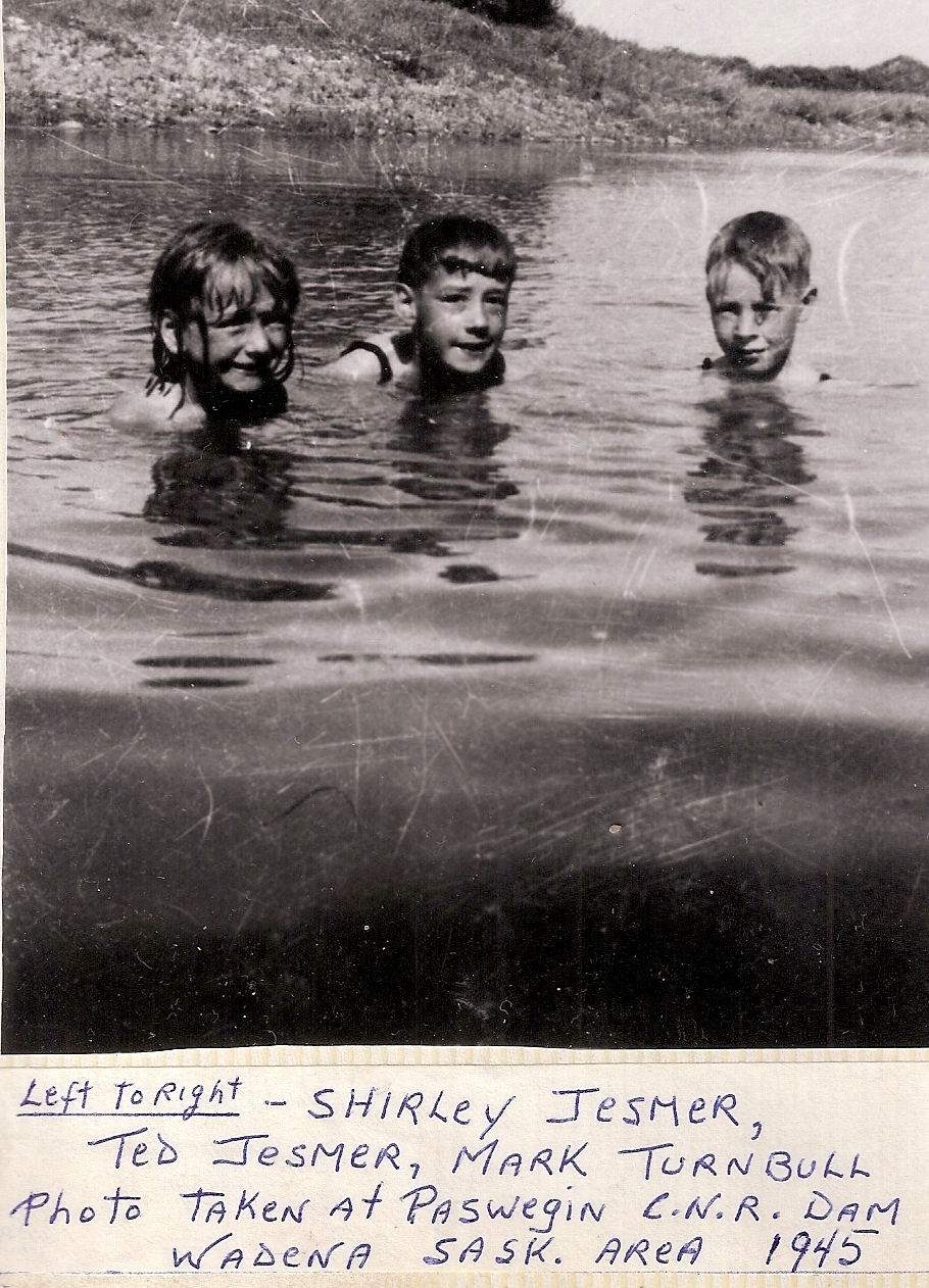 Shirley swimming in the pond with Ted 1945