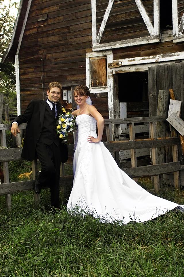 1-ryan and wife infront of barn wedding