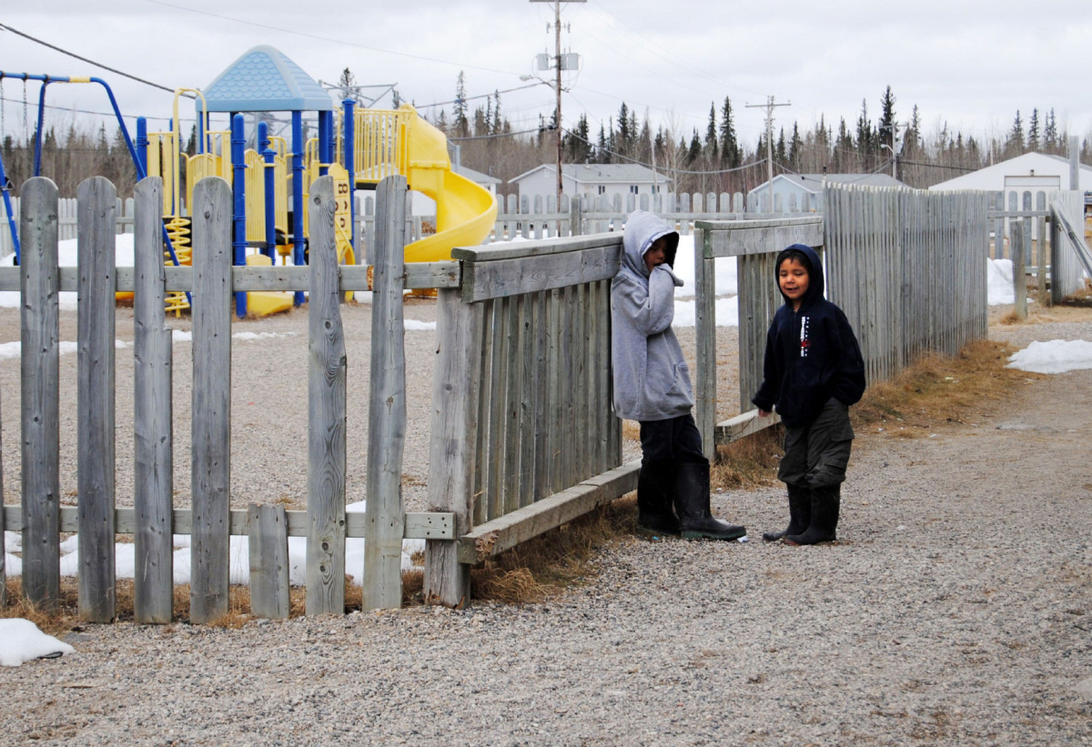 Children outside a playground at Marten Falls First Nation which sits on a "world class" deposit of chromite. March 18, 2010. (Tanya Talaga/Toronto Star)