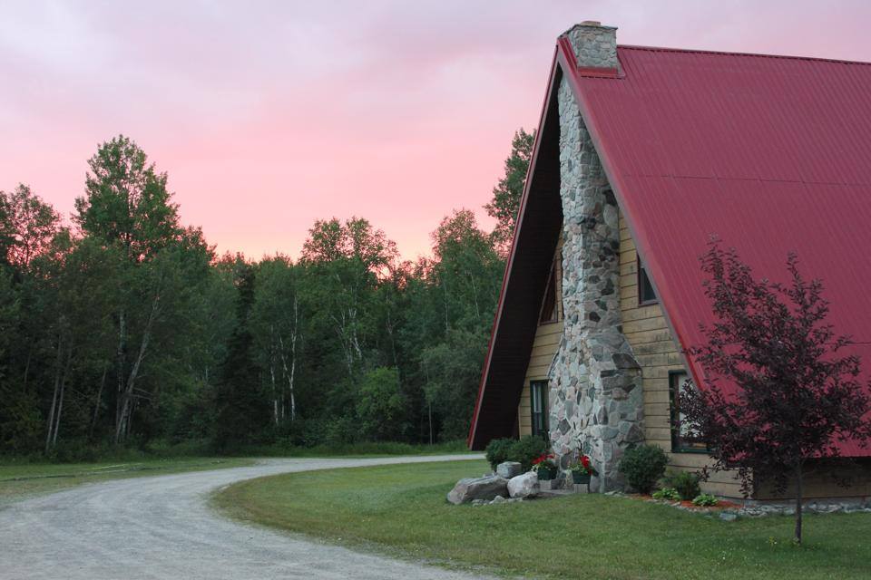lodge with pink skies